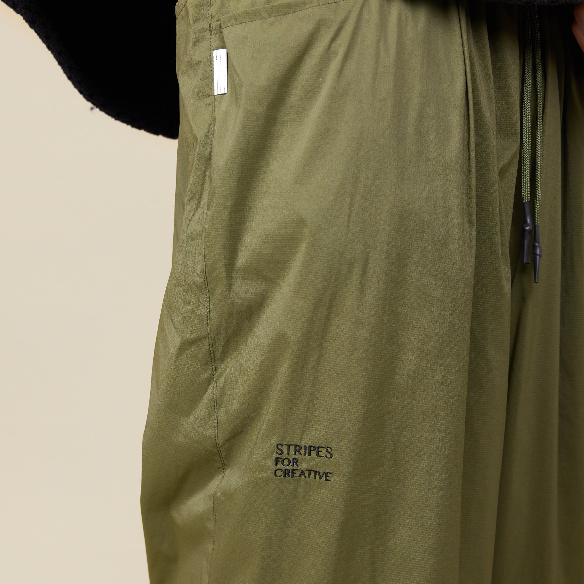 S.F.C Stripes For Creative - Sport Nylon Wide Pants - Olive - Image 3